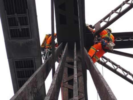 men working on bridge